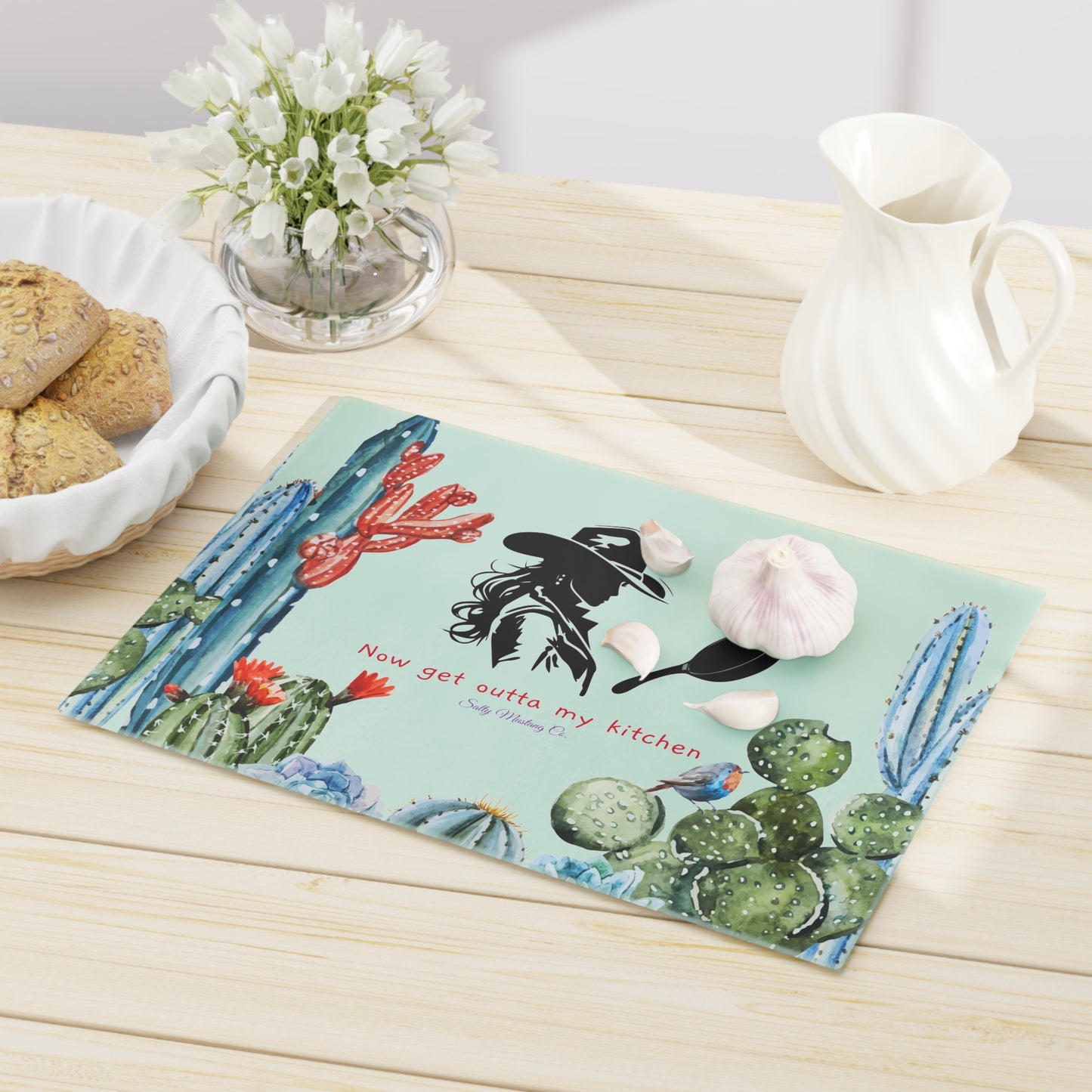 Blue Tone Cactus Border, Cowgirl With Cast Iron Skillet, "Now Get Outta My Kitchen" Glass Cutting Board