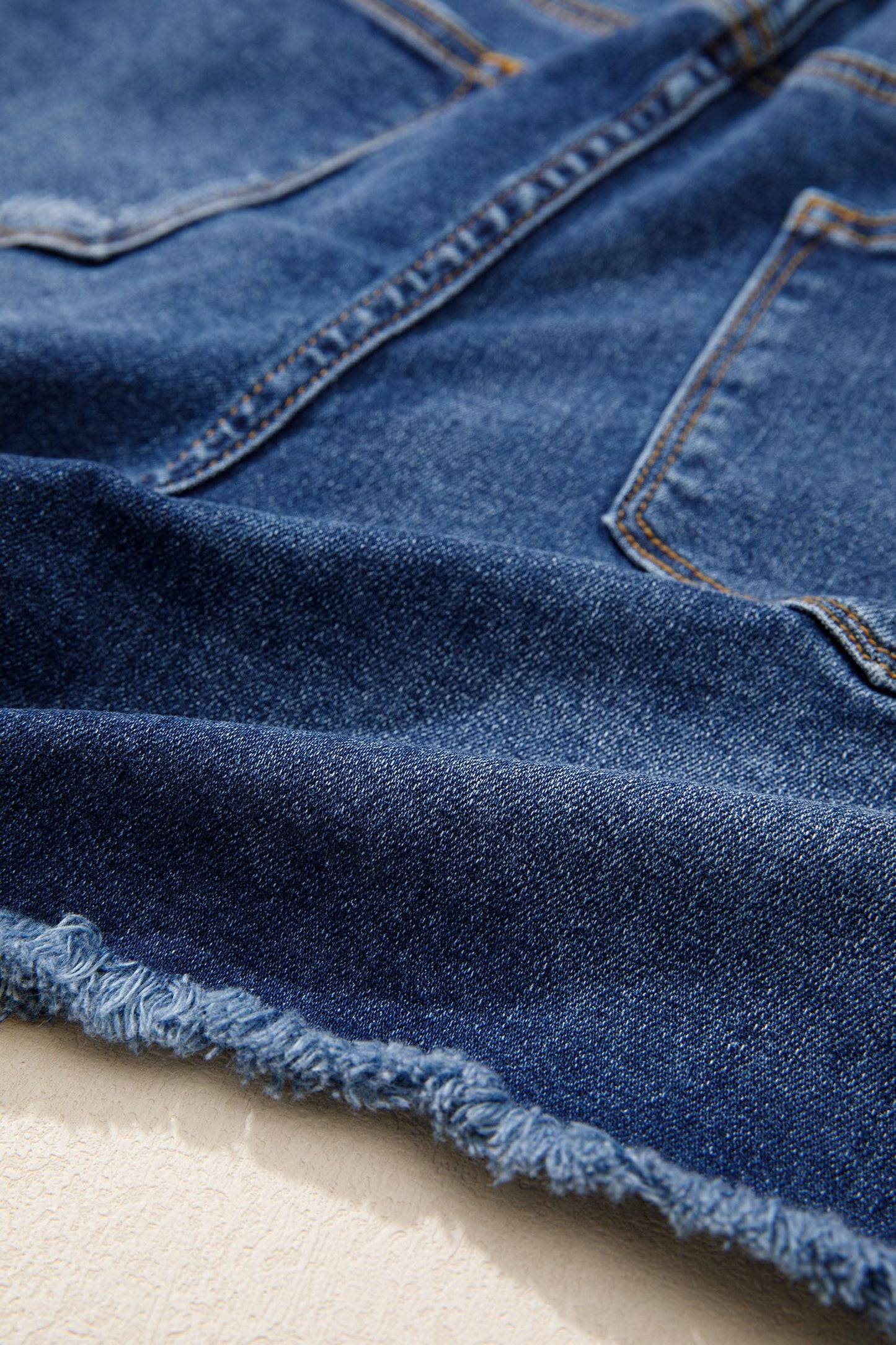 Distressed Denim Asymmetric Raw Hem Shorts