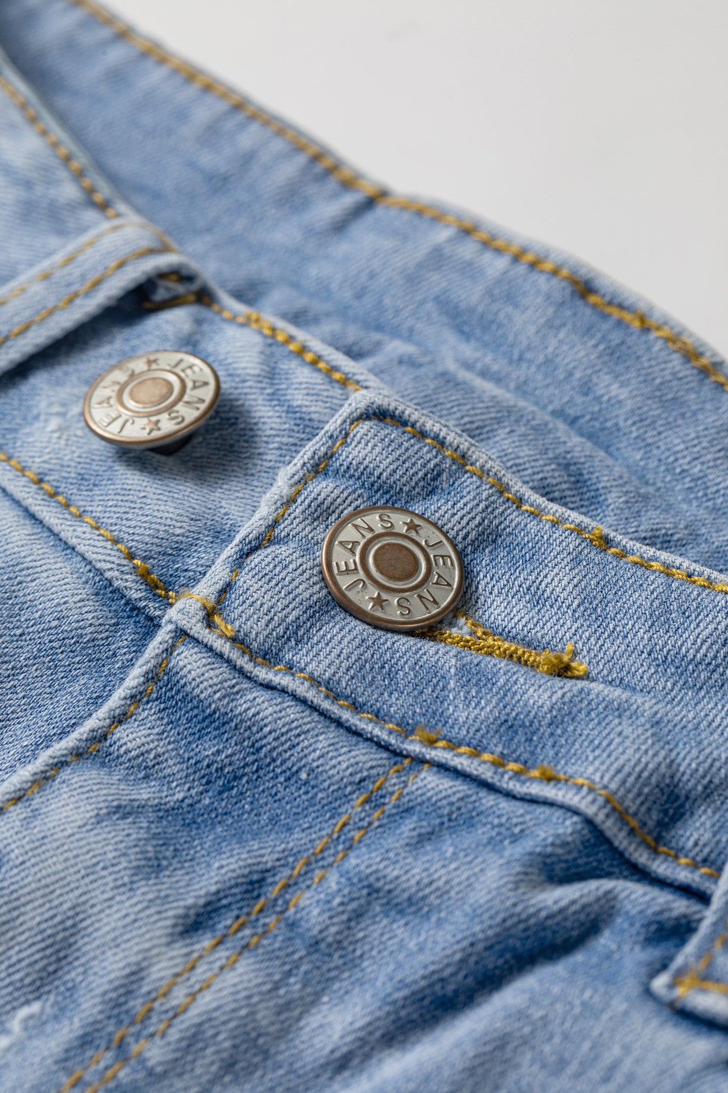 Distressed Denim Asymmetric Raw Hem Shorts