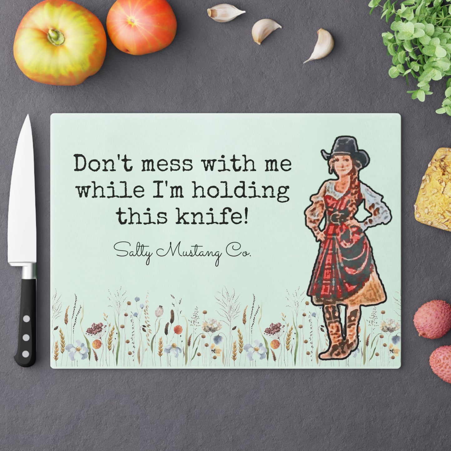 "Don't mess with me while I'm holding this knife!" Cowgirl Cutting Board