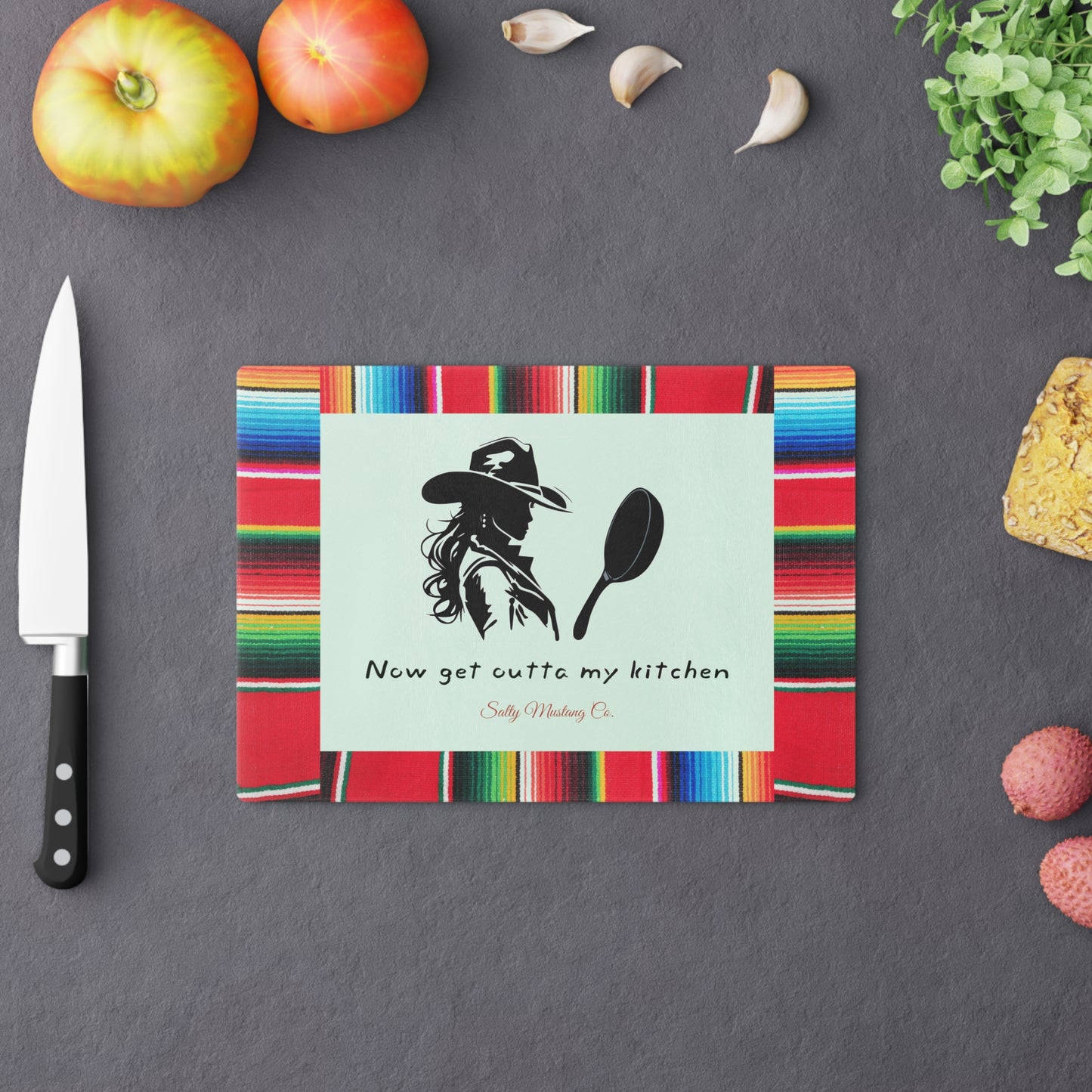 Serape Border Cowgirl with Cast Iron Skillet "Now Get Outta My Kitchen" Cutting Board