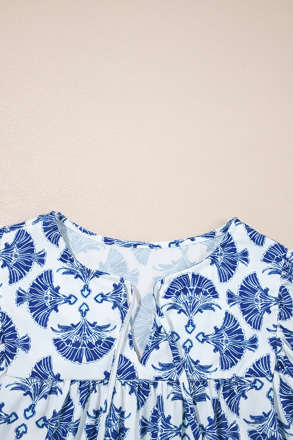 Geometric Tassel Tie V-Neck Short Sleeve Blouse