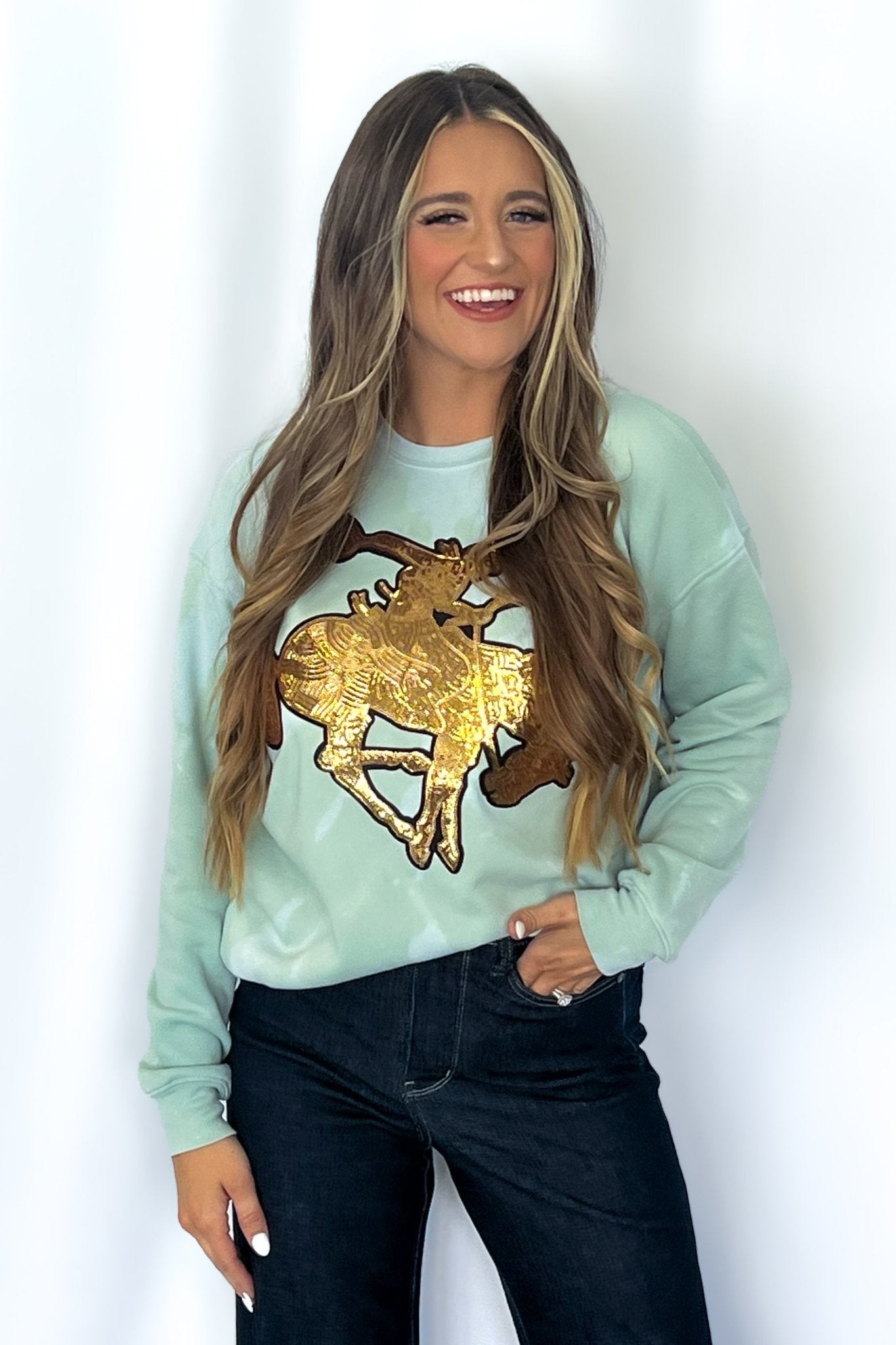 Crazy Consuela "Gold Sequin Horse" Bleached Western Sweatshirt — Bella + Canvas Aqua Sky Background with Cowboy Patch