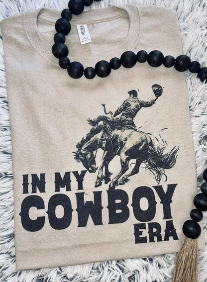 "In My Cowboy Era" Western Graphic Tee — Tan Jerzee Sublimation Print Wild West Statement