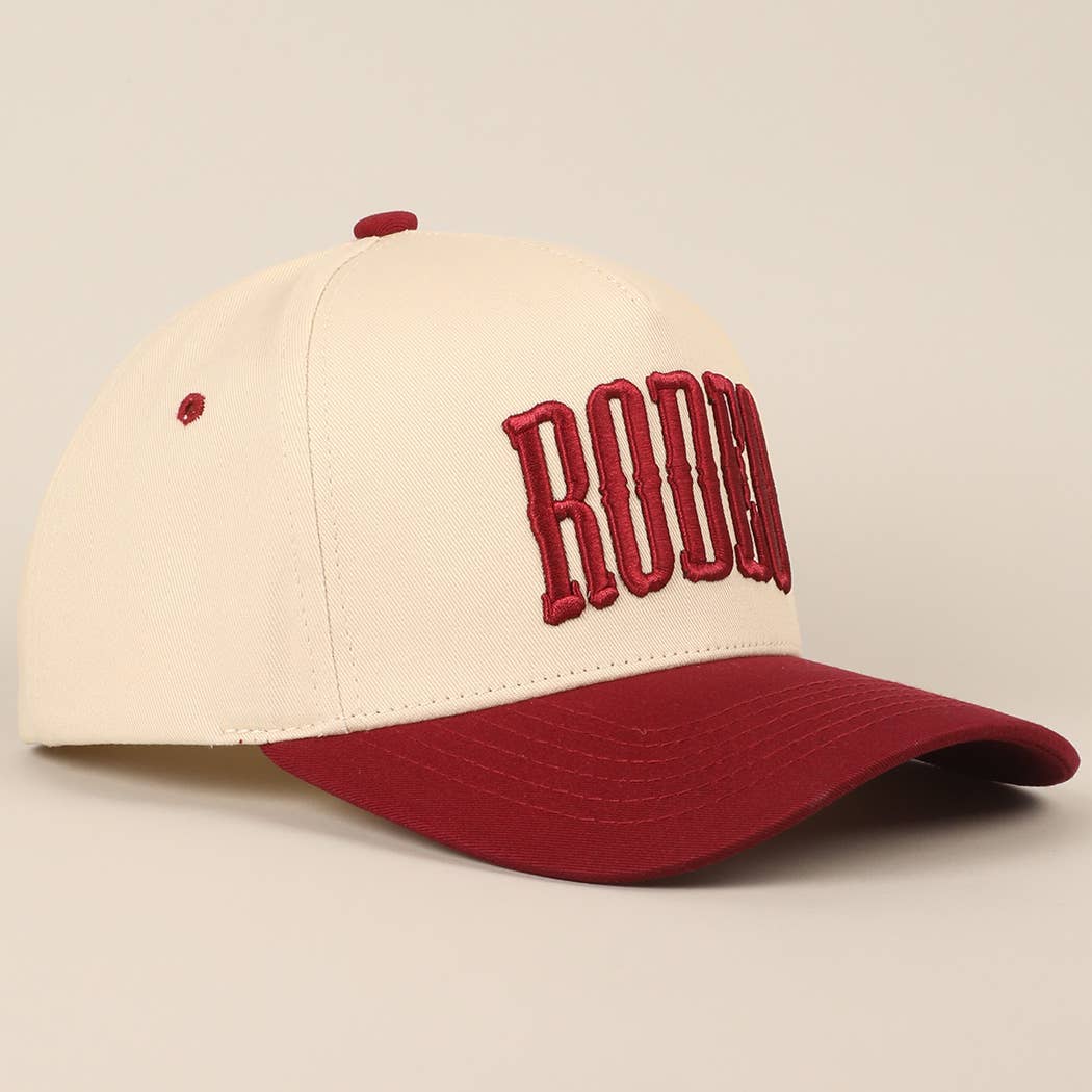 "RODEO" Two-Tone Embroidered Trucker Hat — Wine Red Cotton Canvas with Raised Lettering & 5-Panel Structure