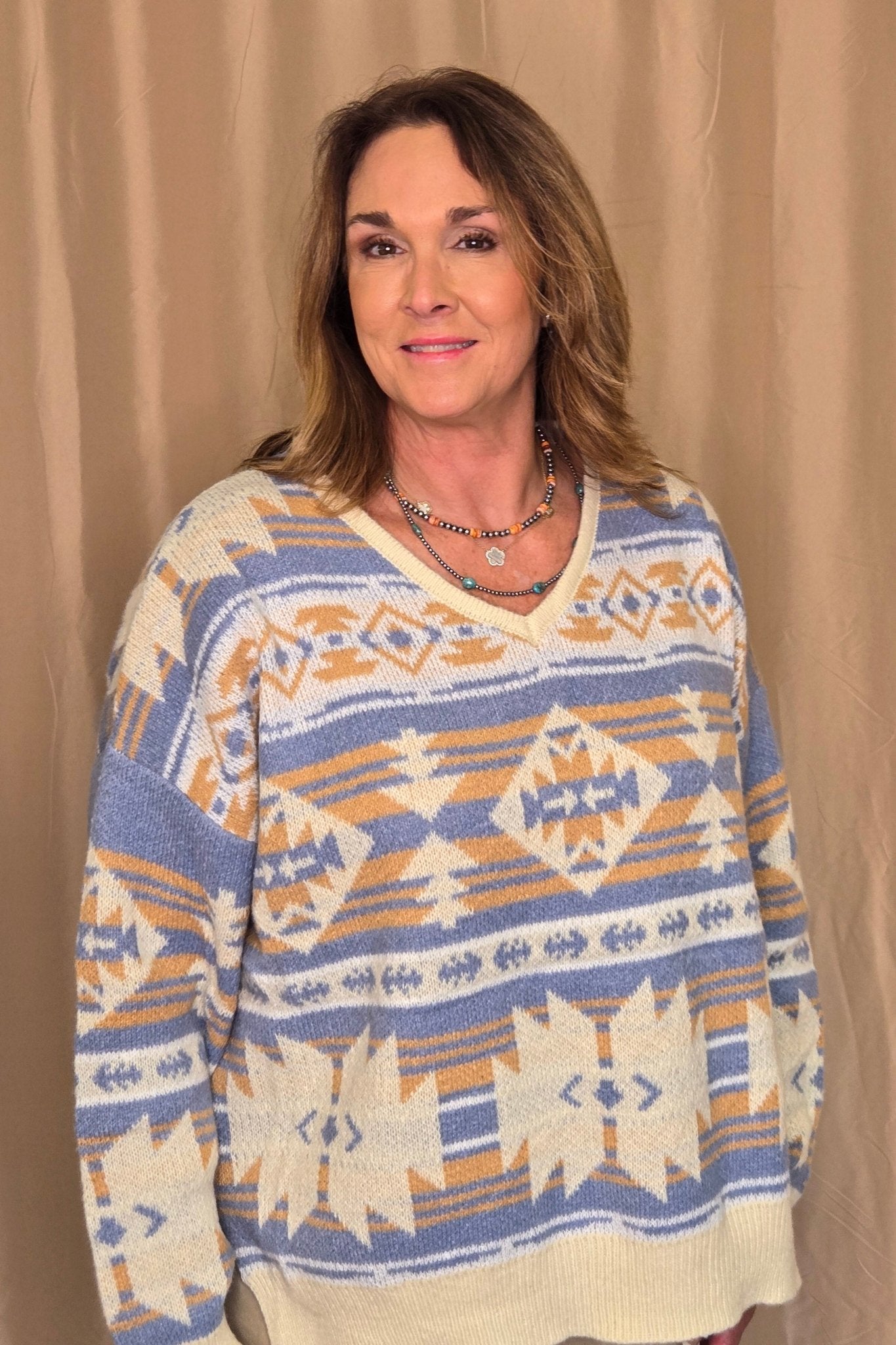 Main Strip Southwestern Knit Sweater — Oversized V-Neck with Bold Blue, Tan & Cream Print