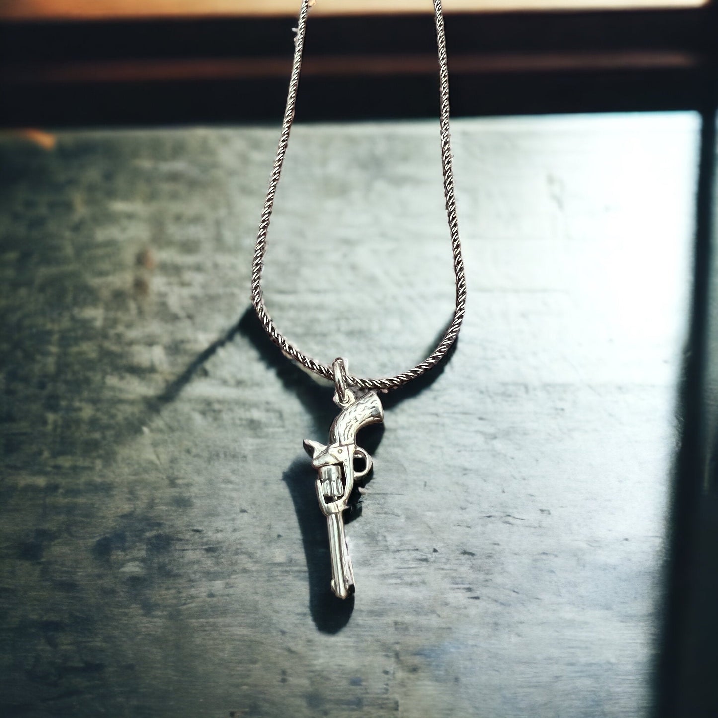 Sterling Silver 3D Pistol Charm/Pendant — Cowboy Six-Shooter with Woodgrain Grips, Oxidized for Detail
